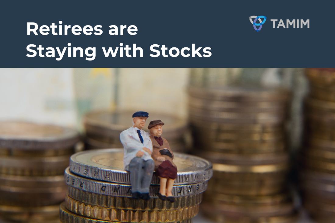 Elderly couple figurine sitting on stacks of coins depicting retirement investment